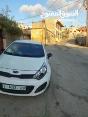  2 كيا ريو 2014 اقتصادية جدا يد ثانية خالية القصص و من العيوب 2000 ديزل  دفعة وشكات السيارة فوق ممتازة