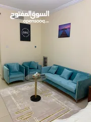  7 For rent in Ajman, studio in Al Yasmeen Towers, opposite Ajman City Centre, new furniture, easy exit
