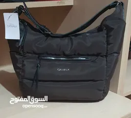  7 حقيبة يد لون بني