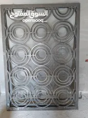  1 بابين حديد و المنيوم بحاله ممتازه