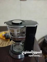 1 ماكينة قهوة