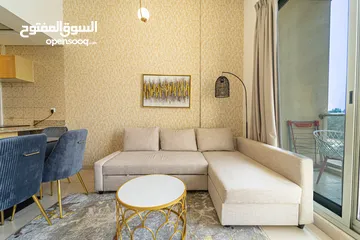 10 دبي مدينة الانتاج الاعلامي IMPZ غرفة وصالة مفروشة سوبرلوكس مع بلكونة - ايجار شهري