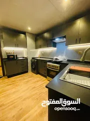  13 For sale in Ajman, in Horizon Towers Ajman, the most elegant and elegant, two rooms and a hall, over