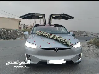  6 تيسلا جيب للأيجار شهري يومي لونيين ابيض وخمري جيب بسعر مغري واسعة من الداخل مارسيدس جي لاند كروز كشف