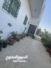  7 ارض دونم مع بيت ارضي وبيت طابقين