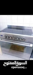  1 electrical italian stove/oven shiney