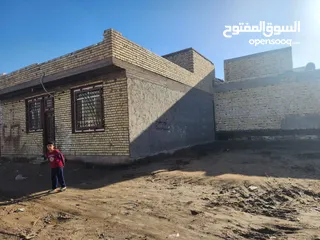  1 بيت 200 م مع قطعه 100 م للبيع في كربلاء