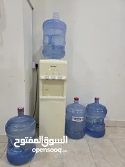  1 Water dispenser with 4 Almanhal/Nestle water bottles-30 BD