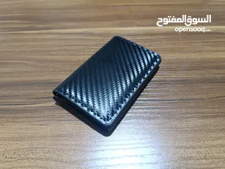  15 محفظة رجالي مميزة للنقد والبطاقات موديل جديد جلد صناعي وستانلس ستيل لون اسود