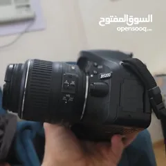  4 كاميرا نيكون D5200 مع عدستين(18-55)mm  و (55-200)mm