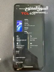  1 هاتف TCL 40 SE بحاله ممتازه مع ملحقات الوكاله