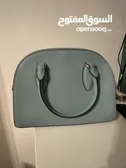  3 Used twice in new like condition medium sized