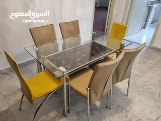  1 طاولة سفره + بوفيه زجاج و ستيل