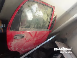  20 اربع ابواب وغطا امامي وغطا خلفي لشيري QQ 2006