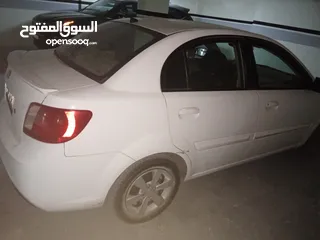  2 كيا ريو لون ابيض 2010 للبيع بحاله ممتاز