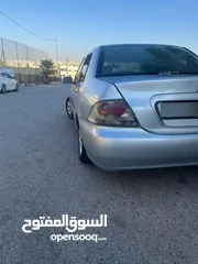  1 متسوبيشي لانسر 2004محدثه بالكامل 2013