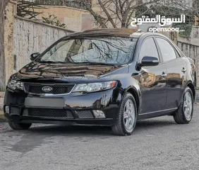  2 كيا فورتي لون اسود فحص كامل فل كامل اضافات موديل 2010 KIA Forte