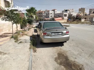  2 ميتسوبيشي لانسر 2004 للبيع