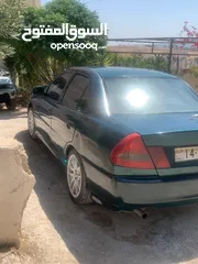  4 متسوبيشي لانسر 1997 موجوده في جرش في مجال للتفاوض بشي بسيط