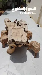  7 طاوله على شكل جذع شجره مع 6 كراسي ماكنة قص العشب