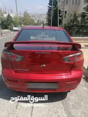  4 ميتسوبيشي لانسر ex 2013 بحالة الوكالة