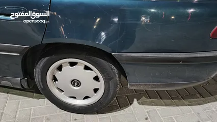  8 اوبل اوميجا للبيع السياره ب حاجه ل صيانه (القير + صنوبرصات) كاوشك جديد كراسي كهرباء السياره فحص خالي