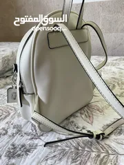 4 GUESS whit ,small bag with silver zippers