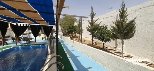  2 شاليه ومزرعة الجمل  مادبا - خربة المخيط - غرب الجامعة الالمانية .............................