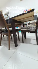  5 Good quality dining table and 7 chairs