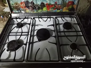 2 بوتغاز يونيرفسال ابيض شغاله فوق تحت وبسعر حرق.....