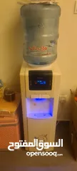  2 used water cooler & fridge
