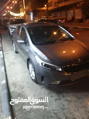  1 السياره المميزه كيا سيراتو 2017_فل اضافات _بنزين _فتحه سقف_ حساسات خلفية وكاميرا خلفيه