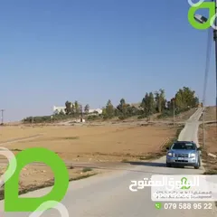  2 تملك قطعة أرض خلف جامعة الإسراء وشارع المطار - المشتى
