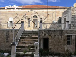  2 بيت قديم ومحلات للبيع