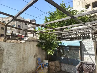 24 شقه ارضيه للبيع كاش او اقساط عن طريق البنك العربي الإسلامي الدولي في عمان حي نزال على الشارع الرئيسي