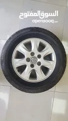  1 205 65 R15 alloy rim + bridgestone tyre (4pcs) - toyota camry
