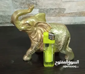 7 فيل نحاس منقوش