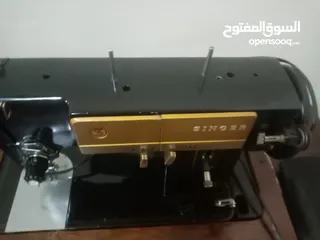  1 ماكينة خياطة نوع سنجر