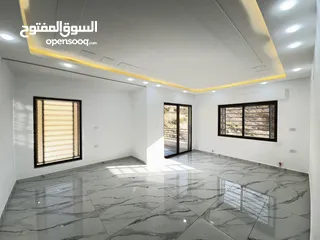  7 شقة طابق ارضي معلقة مساحة 165م بإطلالة دائمة للبيع في اجمل مناطق صويلح بالقرب من الجبيهة