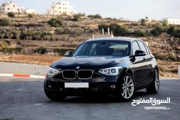  1 BMW 116i السيارة الرياضية