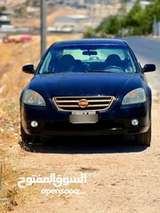  1 نيسان التما بنزين ماتور 2500 لون اسود