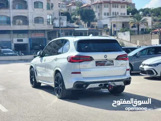  8 BMW X5 45e ترخيص 2022 ترخيص  محرك 3000 هايبرد plug in/يقطع على الشحنه 100 كيلو متر  399 حصان