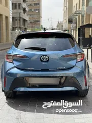  4 ‎تويوتا كورولا 2020 هاتشباك هايبرد (حرة جديد) بحالة الوكالة مميزة