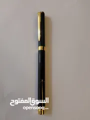 1 قلم مميز ذهبي و اسود للتعليق على الدشداشه