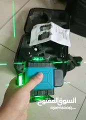  1 ميزان الليزر من ماركة BINLI   - عرض الضوء: 2 مم - للاستخدام الداخلي والخارجي - البطاريات:  2 بطاري
