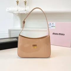  1 Miu Miu  الوان الموسم جمال و أنوثة وأناقة بقطعة واحدة فقط