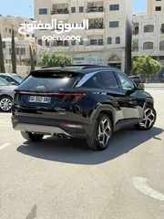  13 هونداي توسان ترخيص 2022 محرك 1600 هايبرد plug in/يقطع على الشحنه 65 كيلو متر