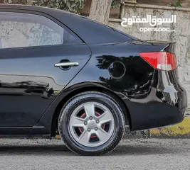  14 كيا فورتي لون اسود فحص كامل فل كامل اضافات موديل 2010 KIA Forte