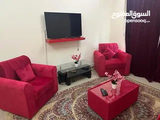  3 محمود سعد)غرفة وصالة للايجار الشهري في الشارقة التعاون بفرش فندقي ثاني ساكن بتشطيب ممتاز
