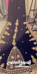  2 عماني مطور طويل من الخلف ملبوس فقط مرتين مناسب لحفلات الخطوبة والاعراس لونه اسود على ذهبي